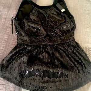 BKE boutique. Sequined open back night on the town top. Sleeveless.